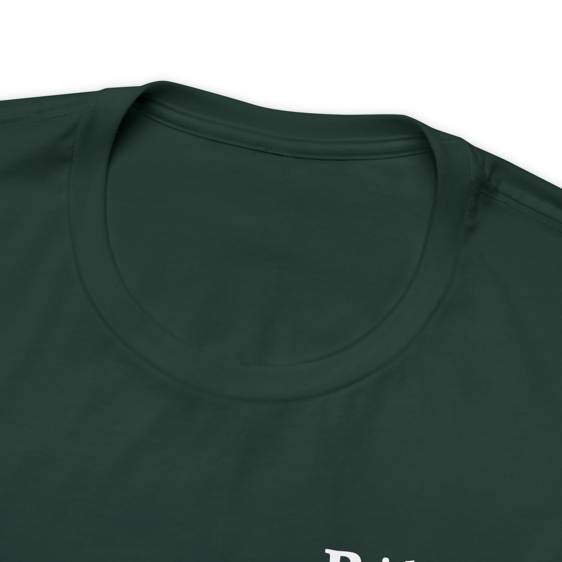 Close-up of the neckline of a dark green Short Sleeve Tee - Small Logo. The fabric appears soft and smooth, likely made from Airlume cotton, with no visible designs or logos around the collar. The photo highlights the stitching and texture of the material.