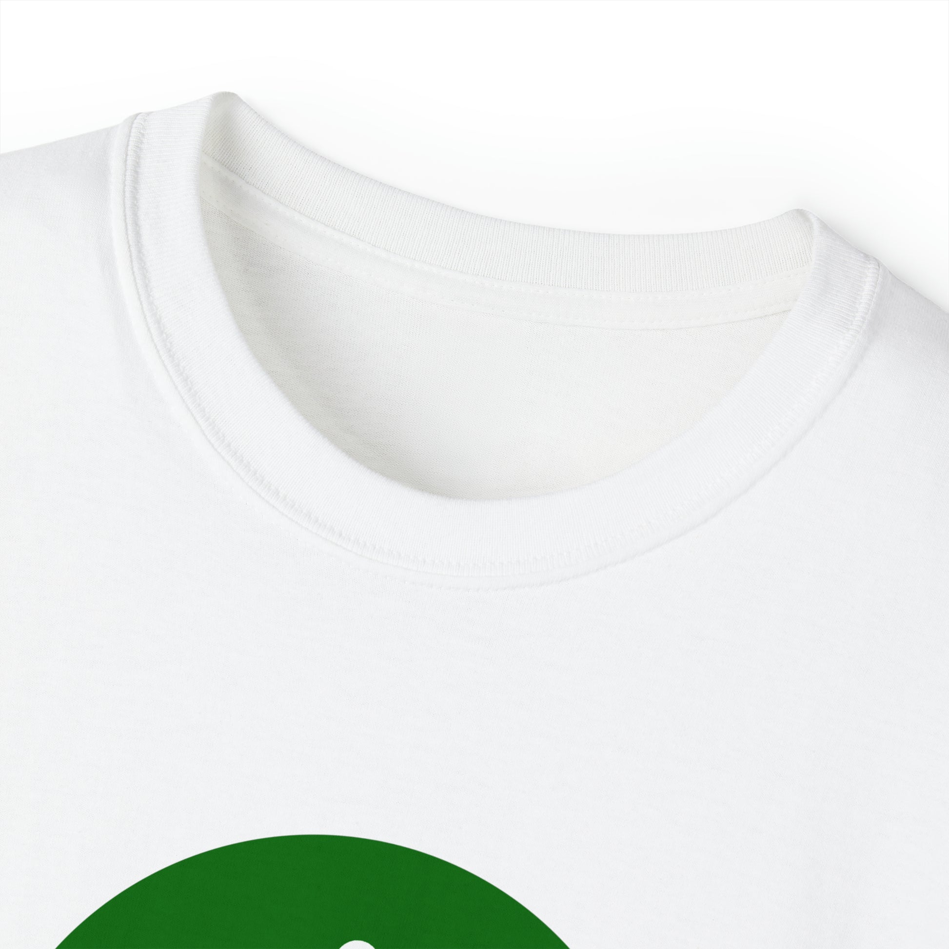 Close-up of a white Unisex Ultra Cotton Tee with a round neckline, featuring a partial view of a green circular design on the fabric. The background is pure white, emphasizing the simplicity and clean look of this BridgeCom Systems apparel.