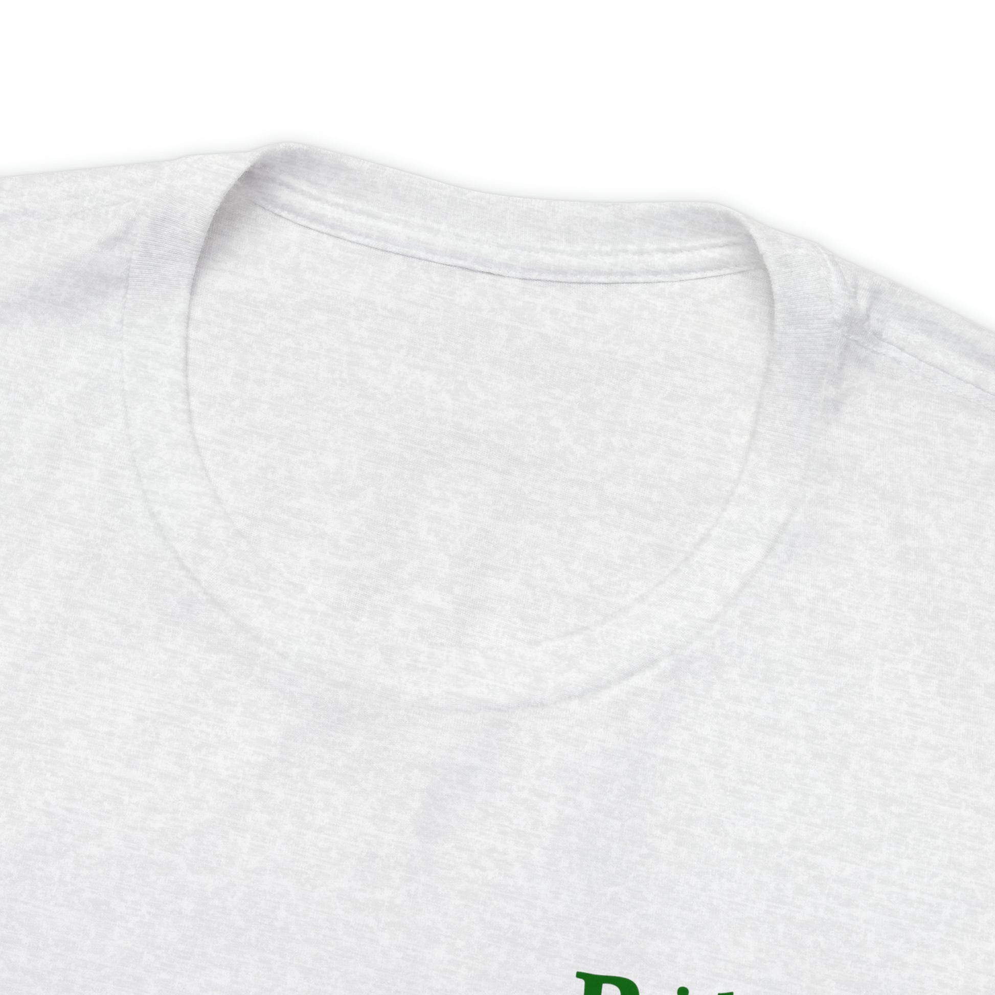 Close-up of the collar and part of the upper section of a Short Sleeve Tee - Small Logo. The T-shirt has green text, partially visible at the lower right corner of the image. The background is white.