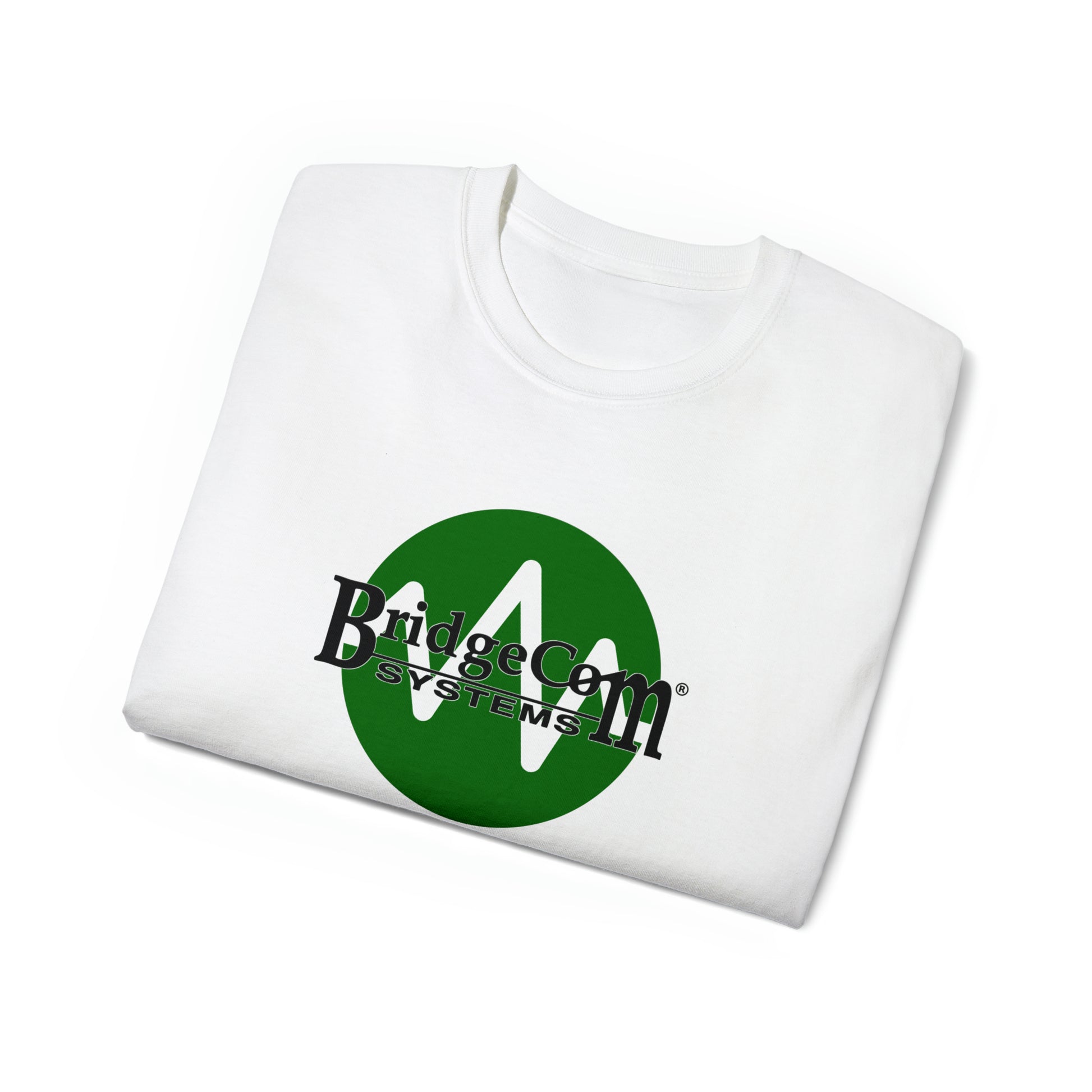 A white Unisex Ultra Cotton Tee is folded neatly with the "BridgeCom Systems" logo printed on the front in green and black text. The design features a green circle with a stylized white letter "B" at the center, perfect for amateur radio enthusiasts.