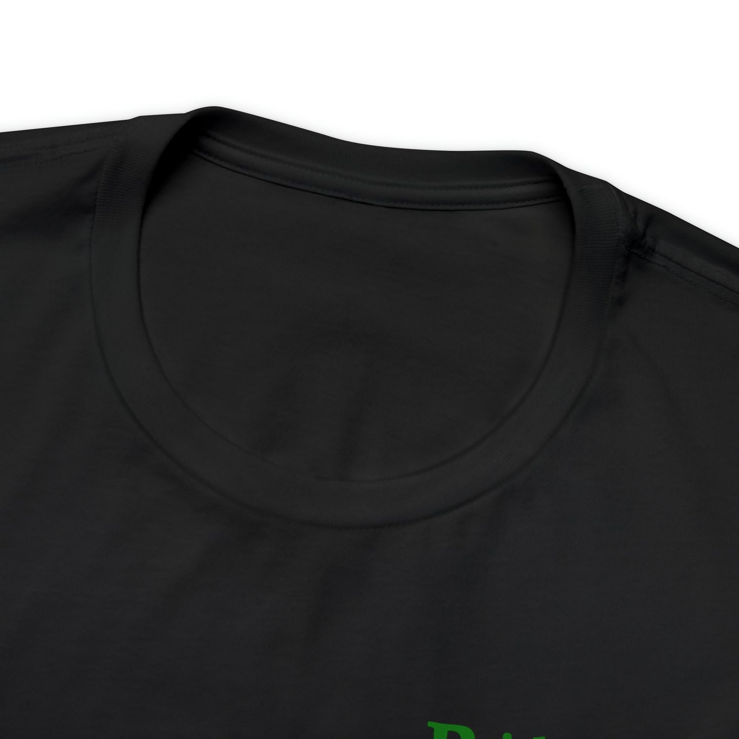 Close-up of the upper part of a "Short Sleeve Tee - Small Logo," showcasing the collar and part of the chest area. The fabric, which is made from 100% Airlume cotton, appears smooth with no visible patterns or designs.
