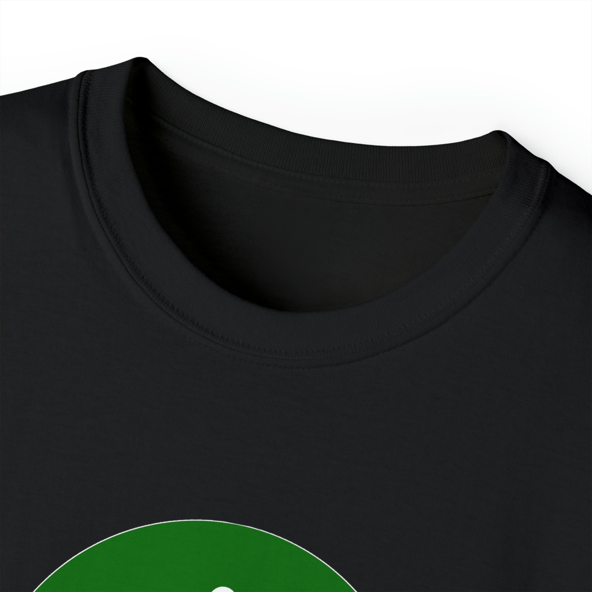A close-up of the collar and upper part of a black Unisex Ultra Cotton Tee, featuring a partial view of a large green graphic on the front. The image highlights the fabric texture and stitching around the collar and neckline, showcasing quality that resonates with amateur radio enthusiasts.