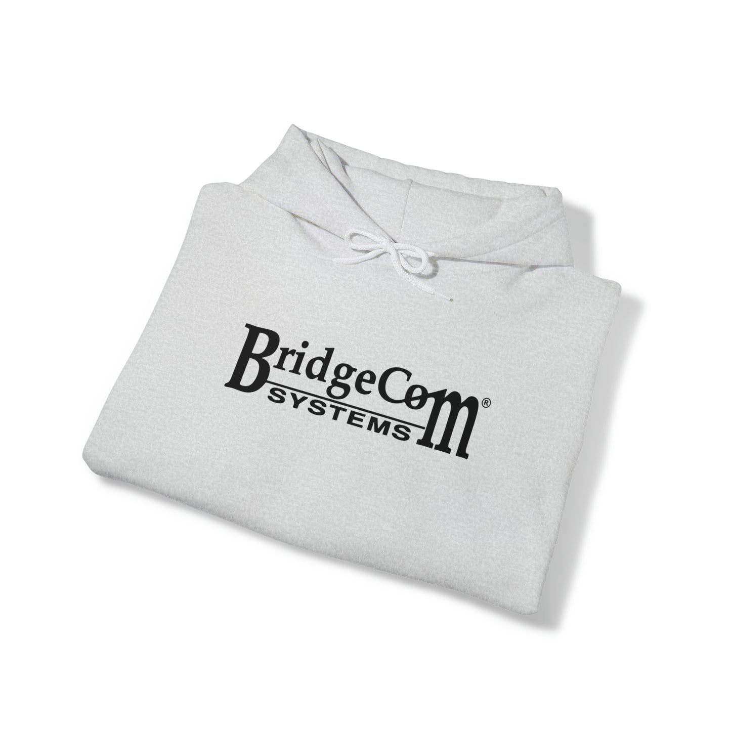 A gray Unisex Heavy Blend™ Hooded Sweatshirt from BridgeCom Systems, made of a 50/50 cotton-polyester blend, featuring the black text "BridgeCom Systems" printed on the front. The sweatshirt is neatly folded on a white background, making it an ideal choice for any amateur radio enthusiast.