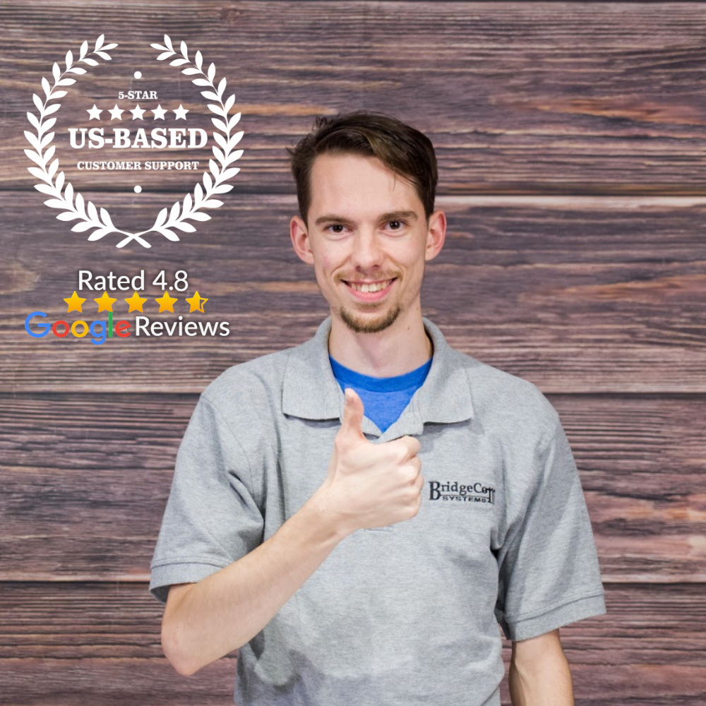 A short-haired man smiles and gives a thumbs-up in a light gray polo with the "BridgeCom Systems" logo. The backdrop shows a wood texture and graphics emphasizing US-based, 5-star customer support, the plug-and-play feature of the AnyTone AT-D168UV, and its 4.8 Google Reviews rating. Product: NEW! 168 Plug and Play Package Deal.