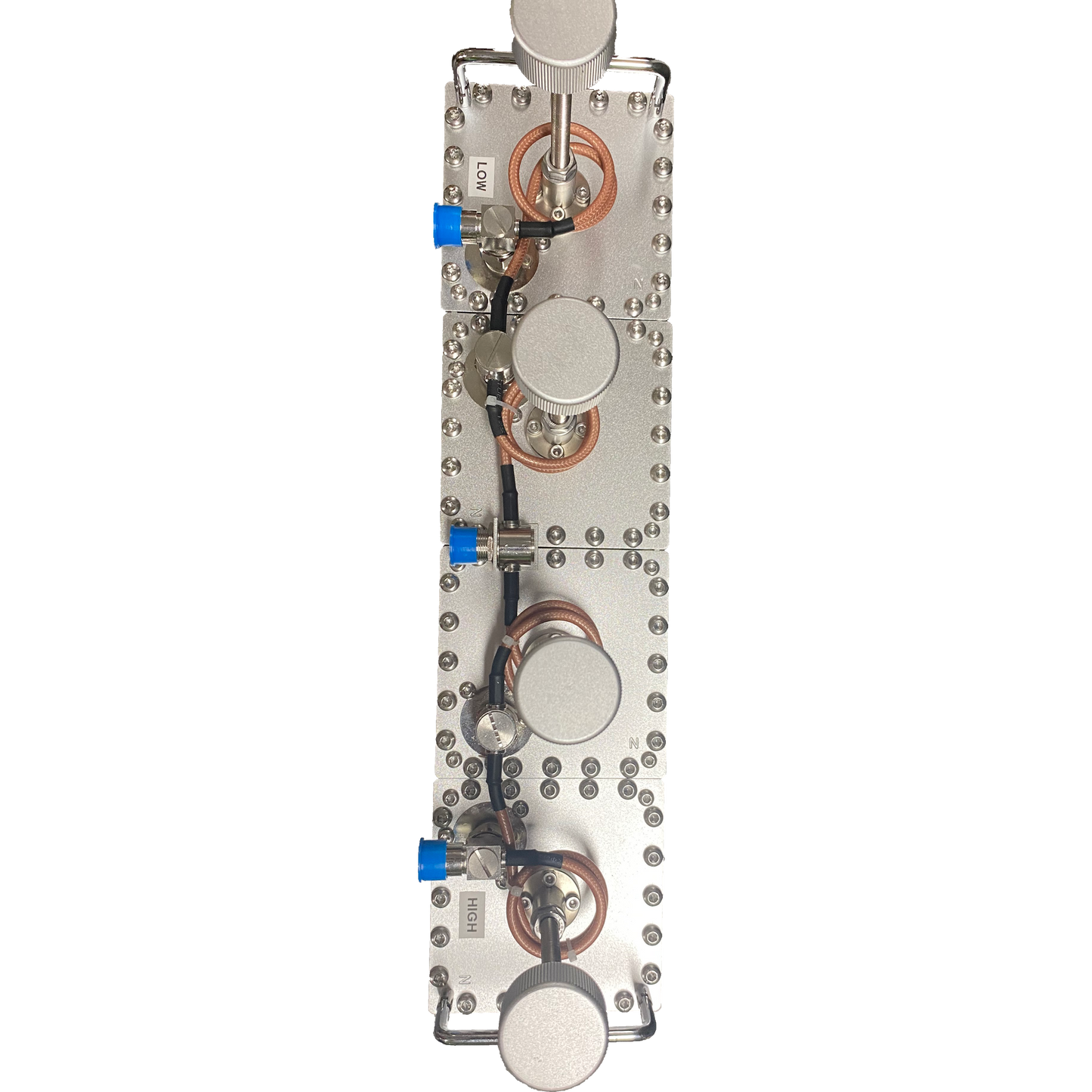 Close-up view of a BCD-144250 250W Amateur and Commercial Duplexer—a silver mechanical device with numerous bolts and components, featuring blue connectors, copper coils, and cylindrical elements. This intricate setup is designed to function for 144-174 MHz frequencies in both amateur and commercial applications.