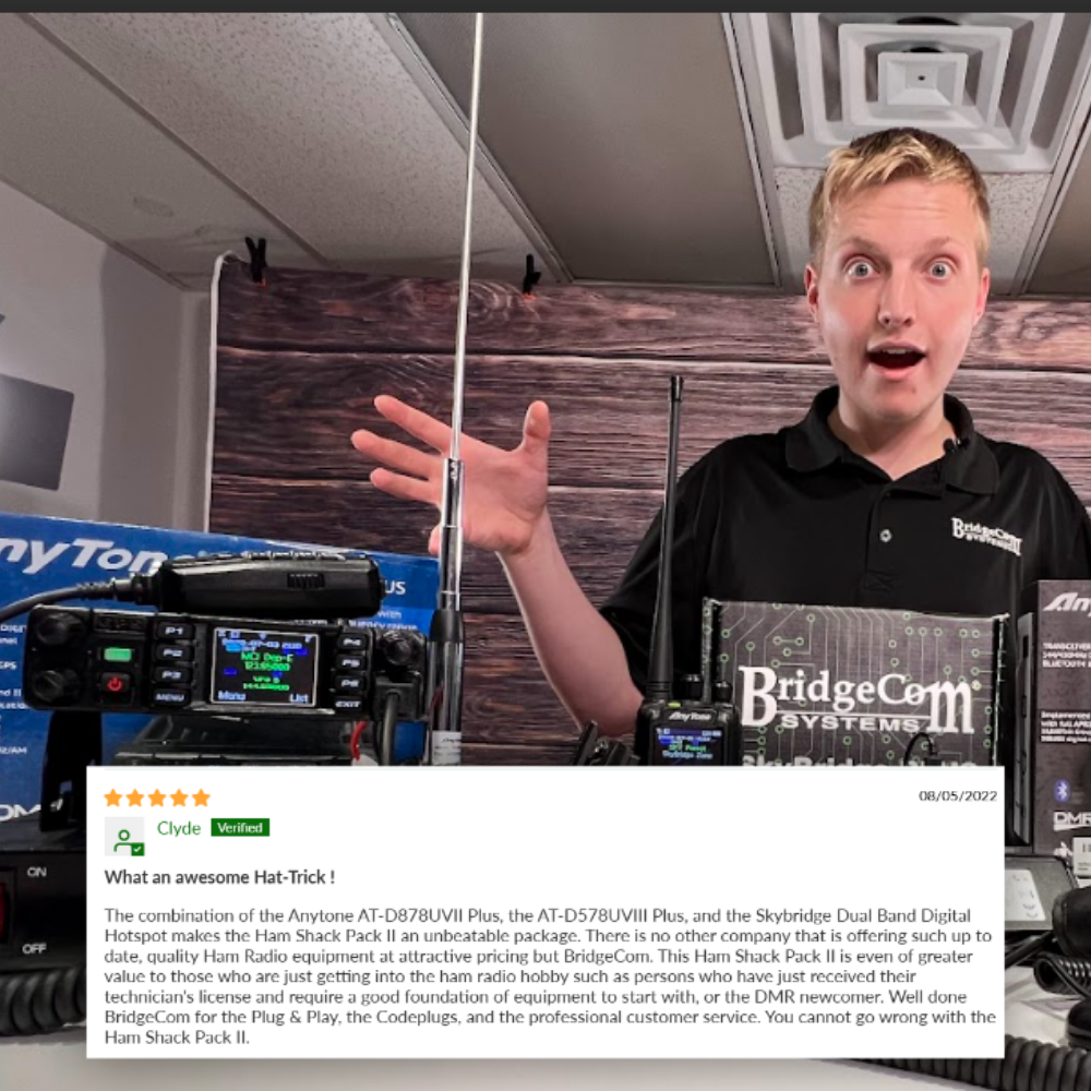 A man stands in a radio store, gesturing excitedly beside ham radio gear and DMR tech. An online review praising the Ultimate Hamshack Pack with $291 in FREE training courses is overlaid at the bottom of the image.