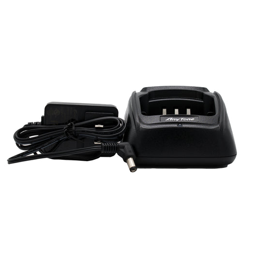 The AnyTone AT-D868UV / AT-D878UV Charging Base Kit includes a black charging dock branded with AnyTone and comes with a power adapter and cord. The dock features slots specifically designed for charging electronic devices, while the adapter has a standard plug for connecting to a power outlet.