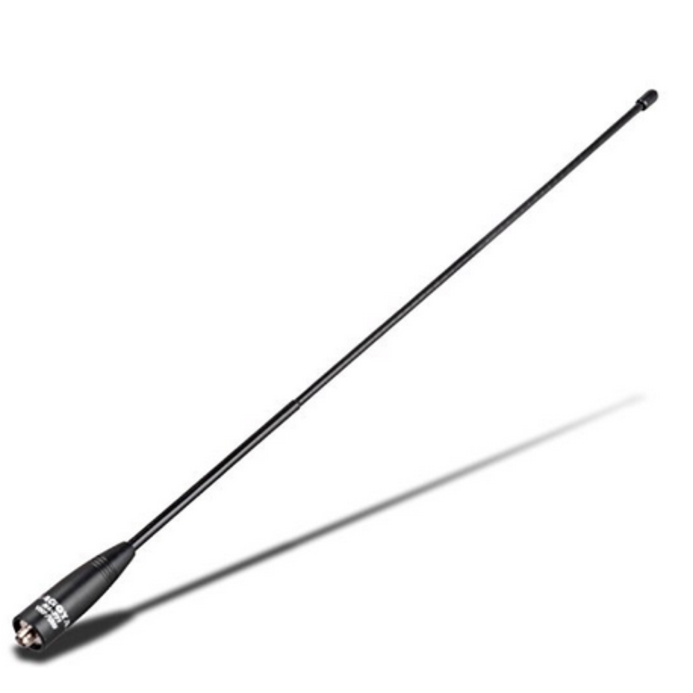 The Genuine Nagoya NA-771 15.6-Inch Whip VHF/UHF (144/430Mhz) Female Antenna, with its black, elongated design featuring a narrow base and wider top, is perfect for outdoor and camping usage. The SMA female base boasts white text and a metallic connector. Set against a white background, the antenna casts an appealing shadow to the right.