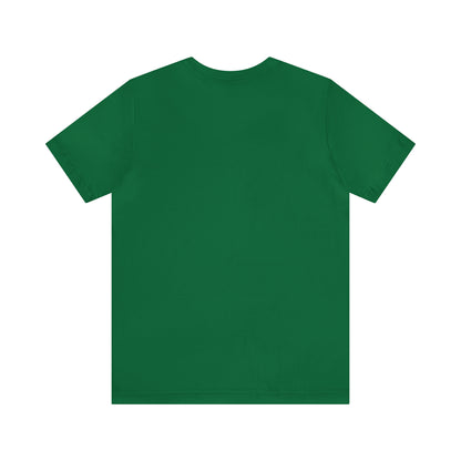 A flat lay image of a plain green Short Sleeve Tee - Small Logo positioned with the back facing up. The shirt, made from soft Airlume combed cotton, is solid in color without any visible logos, designs, or text.