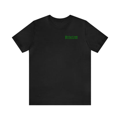 The Short Sleeve Tee - Small Logo is a black T-shirt showcasing a small green BridgeCom Systems logo on the upper left chest, with the text "BridgeCom Systems III." Made from soft Airlume combed cotton, this shirt features a classic crewneck design and offers a simple, clean look ideal for effortlessly conveying your style.
