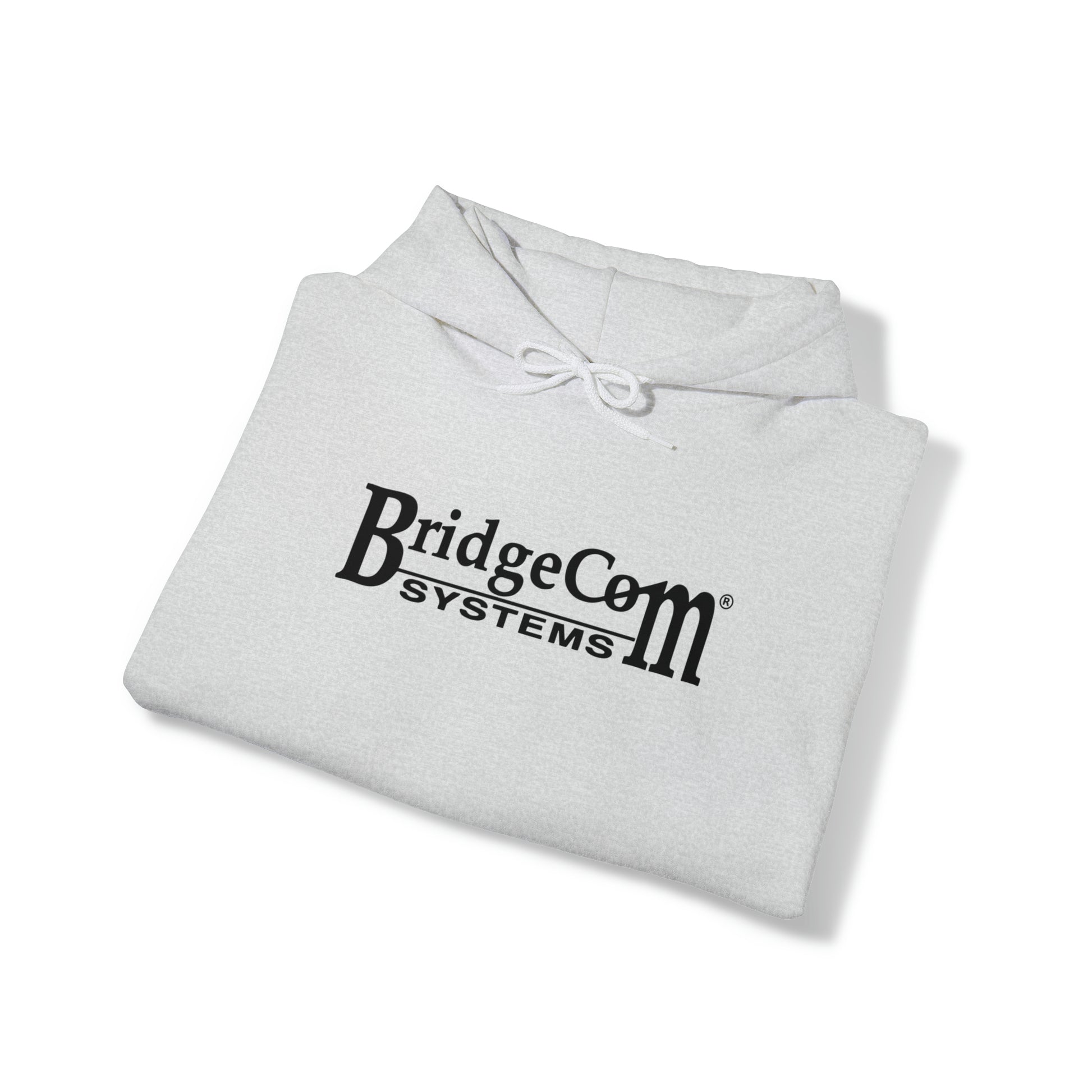 A gray Unisex Heavy Blend™ Hooded Sweatshirt from BridgeCom Systems, made of a 50/50 cotton-polyester blend, featuring the black text "BridgeCom Systems" printed on the front. The sweatshirt is neatly folded on a white background, making it an ideal choice for any amateur radio enthusiast.