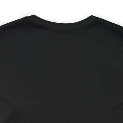 The Short Sleeve Tee - Small Logo is displayed from the back, crafted from smooth Airlume combed cotton. The fabric feels soft, and the T-shirt features a simple crew neckline. There is no visible design or branding on the garment.