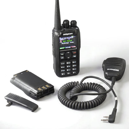 The Maverick Emergency Pack features a handheld two-way HT radio with display, keypad, and whip antenna. Labels highlight Plus, get four bonus items and an exclusive DMR ID card for the ultimate emergency bundle.