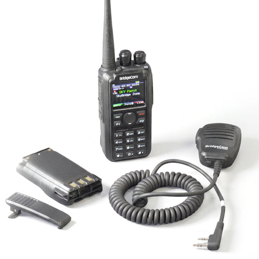 The Maverick Emergency Pack features a handheld two-way HT radio with display, keypad, and whip antenna. Labels highlight Plus, get four bonus items and an exclusive DMR ID card for the ultimate emergency bundle.