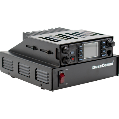 A black LPH-KEN/S Hood power supply unit is shown with a ventilated metal exterior, perfect for pairing with the AnyTone AT-D578UVIII PLUS Tri-Band Amateur DMR Mobile Radio. It has a small digital display with buttons labeled P1 to P5 and Menu. A red on/off switch is visible on the front panel, with "DuraComm" branded on it.