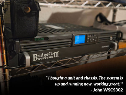 A BCR-GMRS (UHF) Analog GMRS Repeater sits on a metal shelf, its small screen labeled “DUPLEXER.” A black pouch hangs nearby. In the lower-right corner, a customer testimonial from John WSCS302 is displayed.