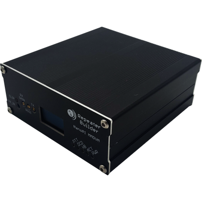 The black metal electronic device labeled "MMDVM Assembly for BCR Repeaters" boasts a small screen, status indicators, ports, and buttons on the front panel. This rectangular unit features silver screws at the corners and ribbed sides for heat dissipation, powered by an Allwinner H3 CPU.