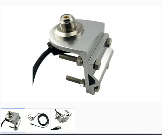 Close-up of the Intellitron AA-1614S Mirror/Rack/Pipe Antenna Mount with SO-239, featuring a metal V-clamp design with bolts and coaxial cable, ideal for securely mounting mobile antennas to vehicles or structures.