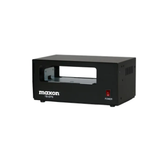 A black rectangular TB-EPS Base Station Power Supply with a power switch and central slot, designed for charging Maxon MP-4000 batteries, is shown against a white background.