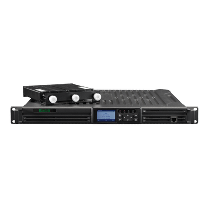 The GMRS Repeater System with Duplexer | BridgeCom BCR-GMRS is a black 1U rackmount server featuring an LCD screen, control buttons, removable hard drive tray, multiple front ports, and ventilation slots.