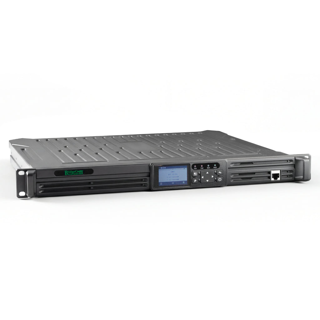 The BridgeCom BCR-GMRS is a black rack-mounted GMRS Repeater System (UHF), FCC Part 95E certified, with a front panel display, buttons, indicator lights, and network ports—shown against a plain white background.