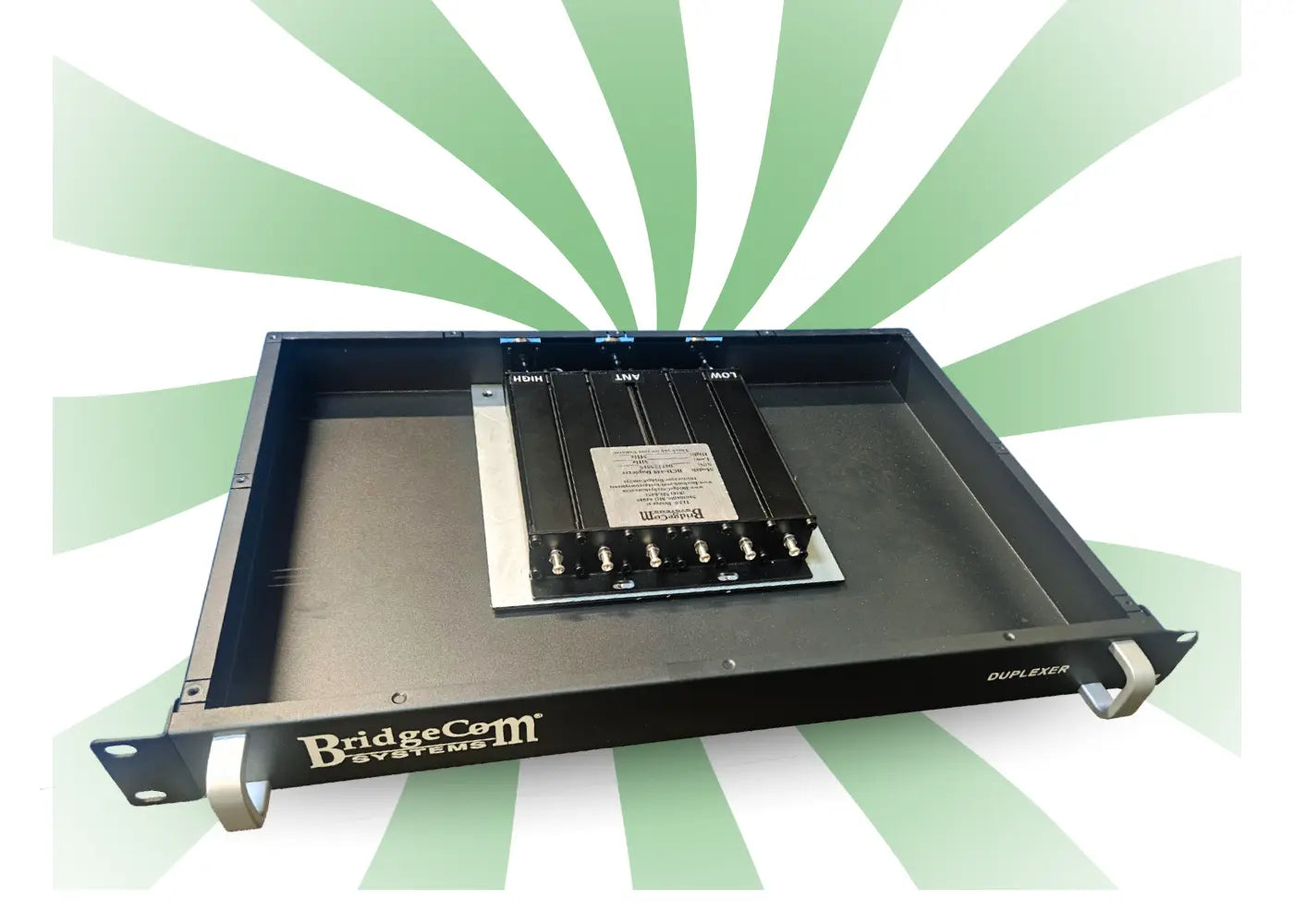 A black BridgeCom Systems BCR-GMRS Repeater & Duplexer Power Bundle is rack-mounted, set against a background of green and white radial stripes.