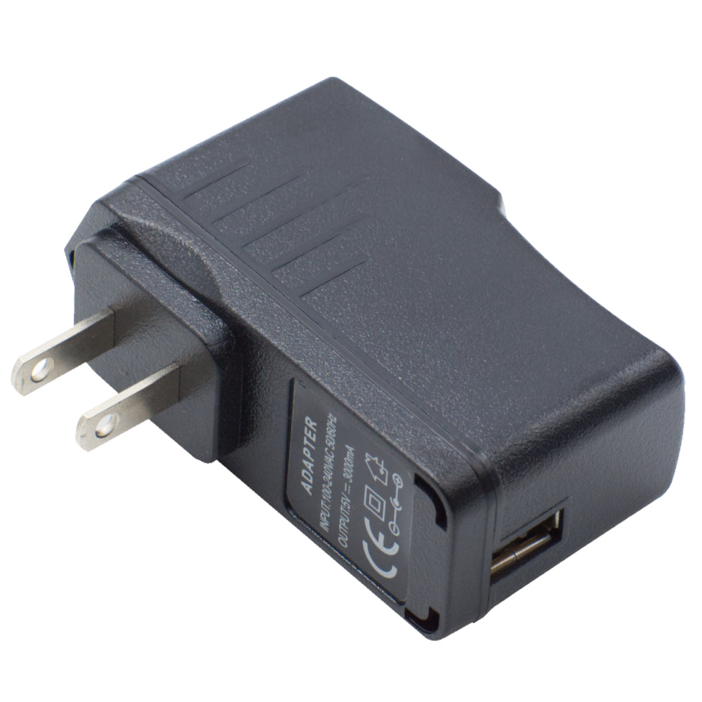 The 5V 3A Skybridge Power Adapter - Wall Charger is a black electrical plug adapter with a standard two-prong design for North American outlets. It features a textured surface, a single USB port on one end, and voltage and certification markings on the side.
