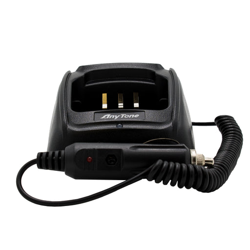 A black AnyTone AT-D868UV / AT-D878UV Mobile Battery Charging Kit featuring a coiled 12v power point cord and a plug. The charger is equipped with metal contacts for connecting the AnyTone AT-D868UV radio, and the AnyTone logo is prominently displayed at the front.