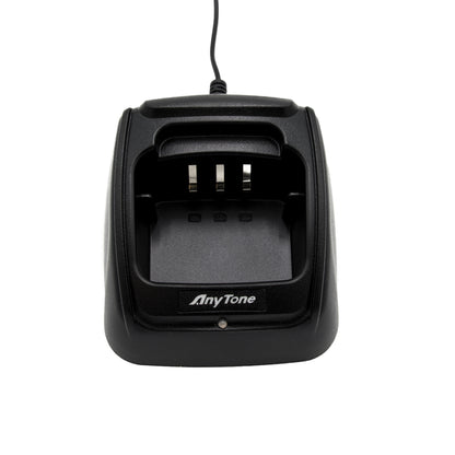 A black AnyTone AT-D868UV / AT-D878UV Charging Base Kit with a connected power cord. The dock features three metal prongs inside and has the AnyTone logo printed on the front. The charging slot is prominently visible, designed to accommodate devices like the AnyTone AT-D868UV and AT-D878UV.