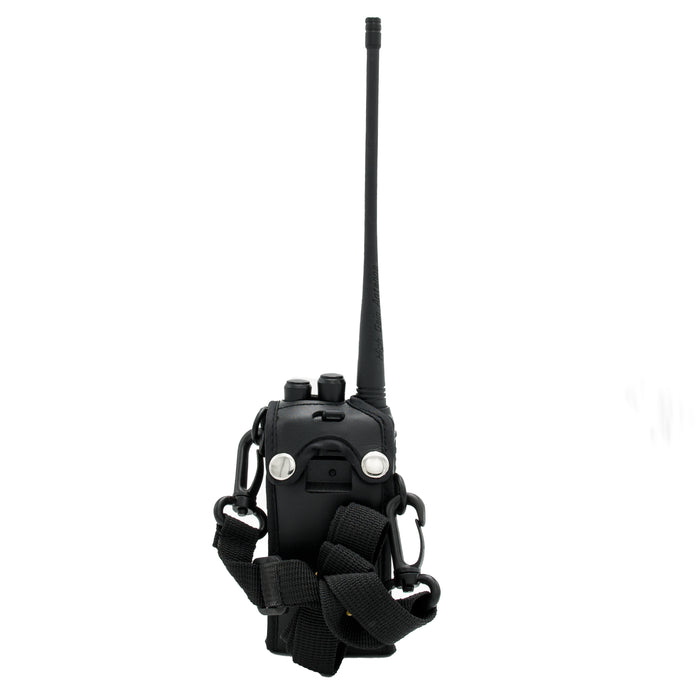 The Heavy Duty AnyTone 868/878 Protective Case is designed to hold a black portable two-way radio with an extended antenna. The device includes several buttons and two silver knobs on the top, and it comes with a faux leather protective case, a black strap, and clips for easy carrying.