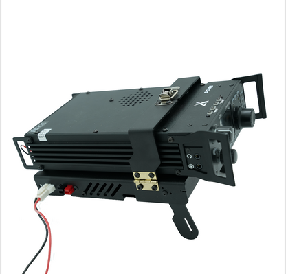 A black Xiegu G90-H1 Cooling Bracket cradles an amateur radio transceiver with a sturdy metal housing, two manual knobs, and multiple connection ports at the front. The device is positioned at an angle, showing attached cables and the mounting bracket. It features a smart temperature sensor for efficient cooling.